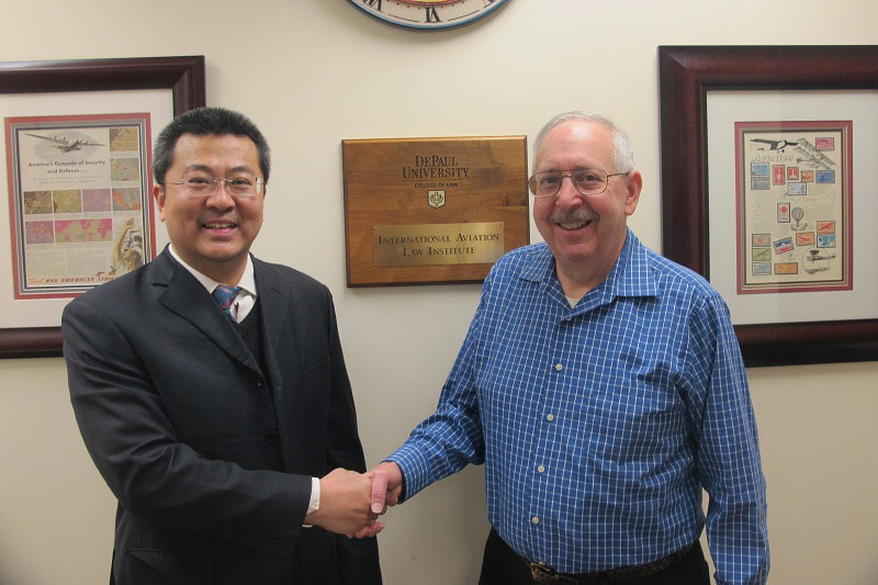 IALI Professors Weiman Diao (left) and Stephen Rudolph of DePaul Law